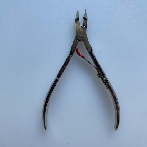 Manicure and cuticle nippers used, various models including Credo Solingen