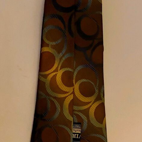 Vintage Trevira tie with geometric pattern in brown and gold, like new
