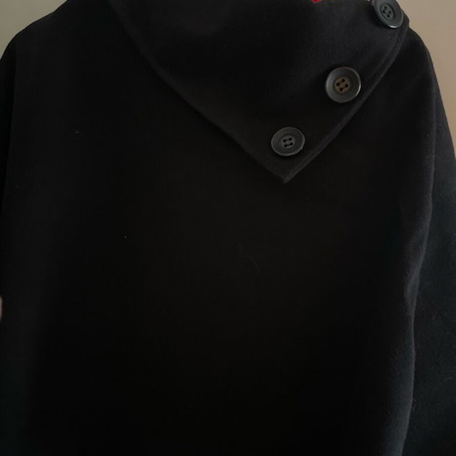 Black cape like new, worn very little