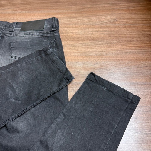 Men's/Unisex black jeans with faded finish like new