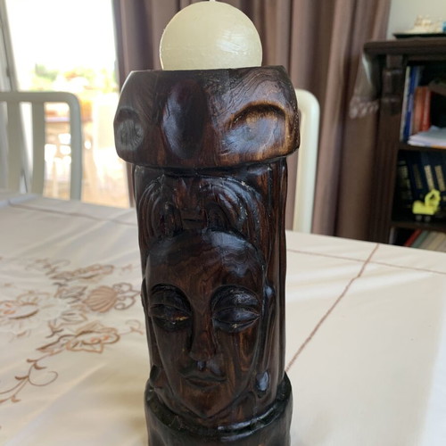 Wooden carved candlestick with embossed decoration