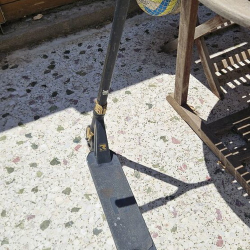 Root Industries Invictus Gold Rush freestyle scooter used with helmet and pads
