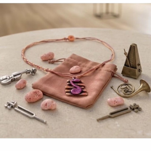Necklace with musical note on staff, silver motif