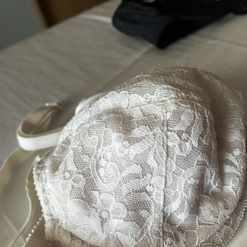 Bras extra small used, black satin and white lace set of two
