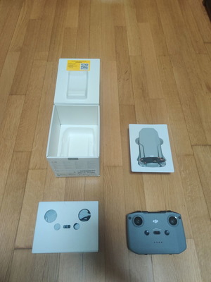 DJI Mini 4K drone with controller and box