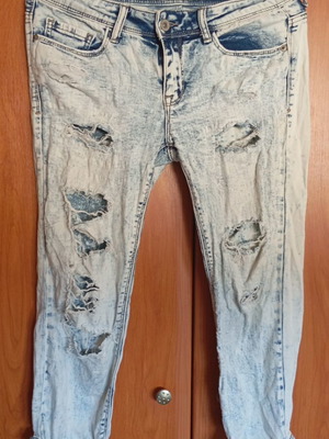 Women's jeans with rips faded style like new Tally Weill