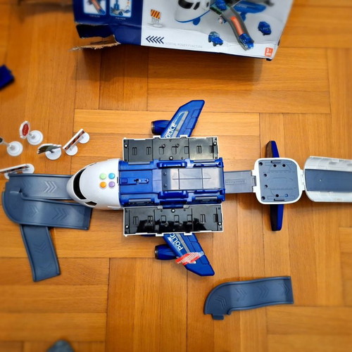 Airplane toy used with lights and sounds, transforms into station