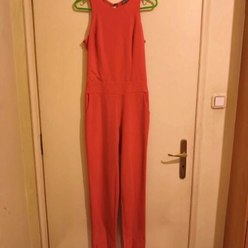 Jumpsuit coral color with lace back opening like new