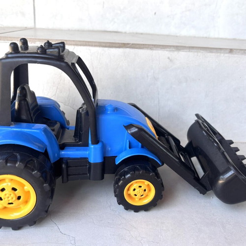 Plastic bulldozer toy used, blue and yellow
