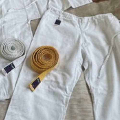 Martial arts pants used with white and yellow belt for adults