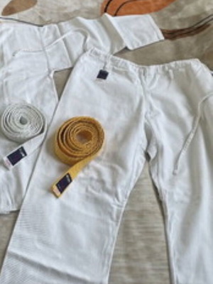 Martial arts pants used with white and yellow belt for adults