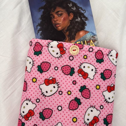 Handmade booksleeve with soft lining and button closure