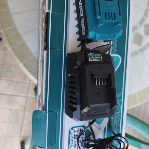 Total cordless hedge trimmer with battery and charger