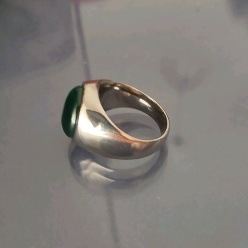 Steel ring with green stone like new
