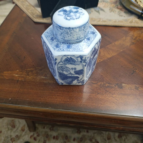 Hexagonal decorative vase with scenes