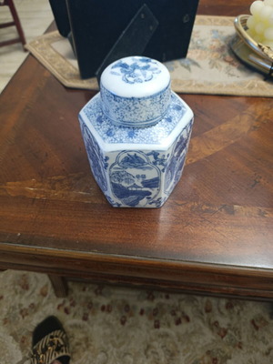 Hexagonal decorative vase with scenes