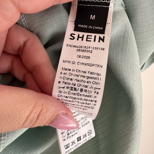 Shein sleeveless blouse new with tags, floral print, size M