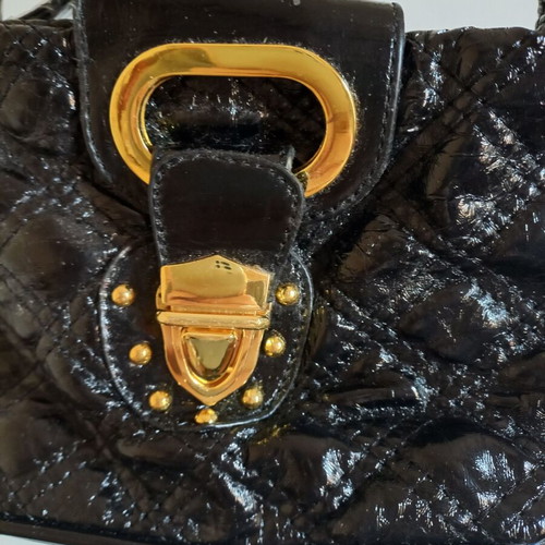 Black shoulder bag new with gold details