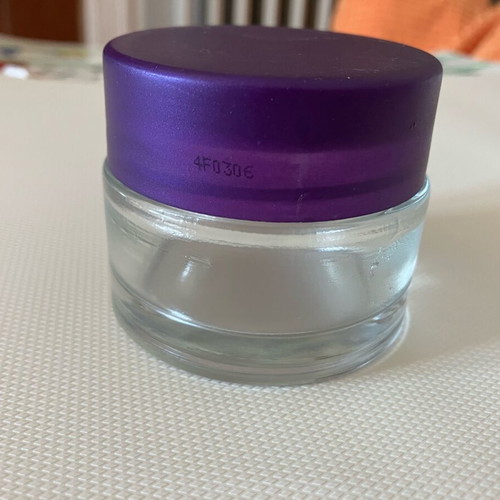 Empty 50 ml container made of thick glass, like new