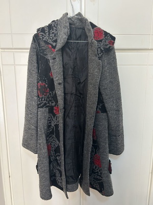 Coat with embroidery used, black and red