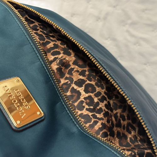 Victoria's Secret shoulder bag petrol fabric with animal print lining like new