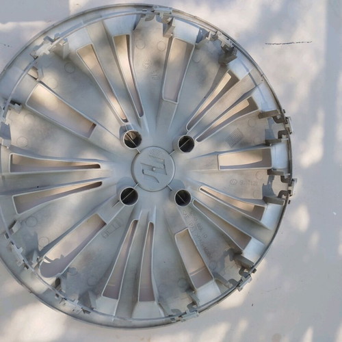 Suzuki Swift hubcaps used, set of 4 for 15 inch rims