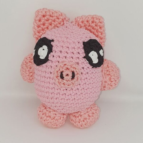 Handmade crocheted doll faces new, piglet