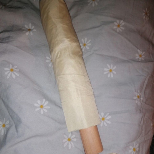 Beige umbrella like new with wooden handle and case