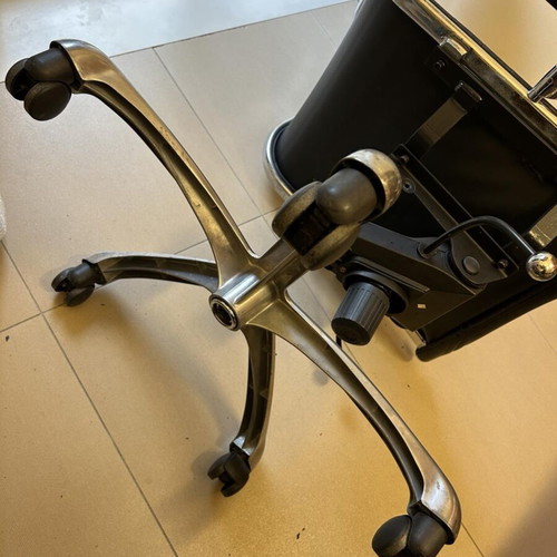 Neoset executive office chair used with ribbed black leather and chrome frame