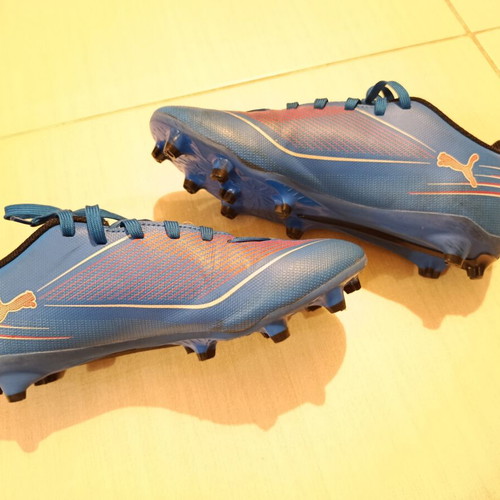 Puma football shoes like new, size 36, blue with orange details