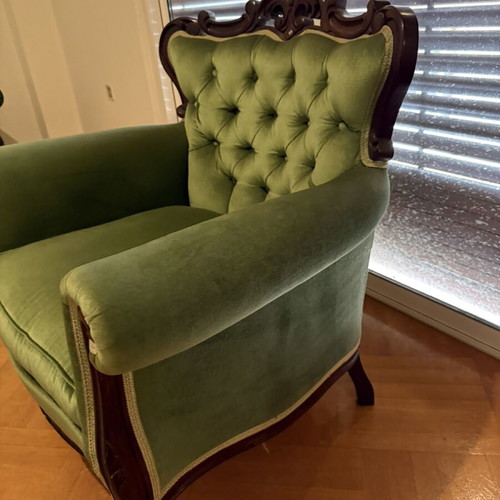 Vintage classic armchair with solid wood and green velvet upholstery