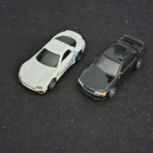 Hot Wheels collection lot with Boneshaker, Skyline and RX7 premium cars