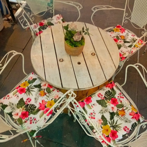 Wrought iron chairs set with round wooden table, vintage