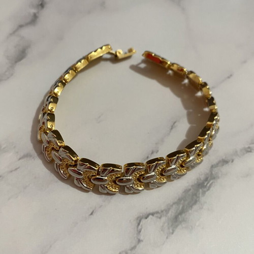 Bracelet in gold and silver colors like new