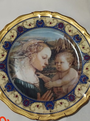 Decorative wall plate like new, gilded with fantastic design