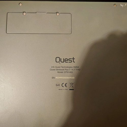 Quest Slimbook Plus 14.1" FHD laptop used with mouse and bag