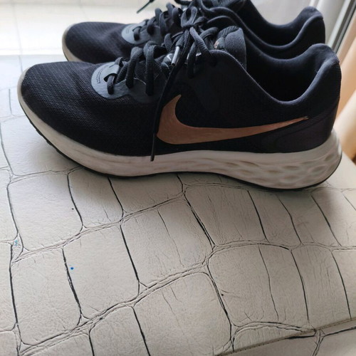 Nike shoes size 38.5 used, black with gold logo, athletic