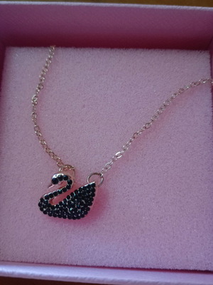Swan necklace like new, pink gold tone with black stones