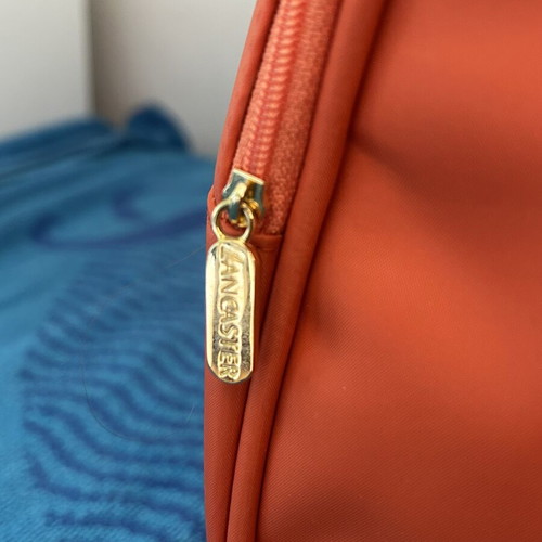Lancaster small backpack new, waterproof, orange and white
