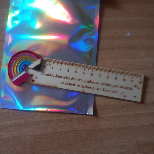 Wooden ruler with engraved phrase, new