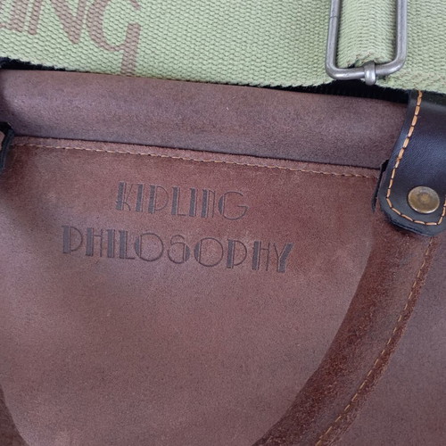 Kipling leather travel bag camel color like new