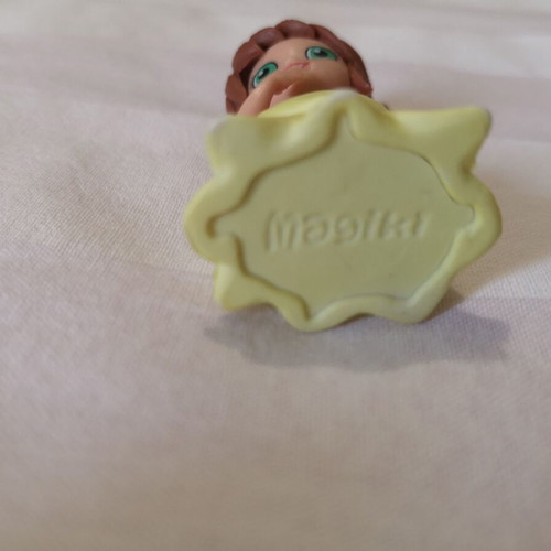 Girl figure with yellow dress used