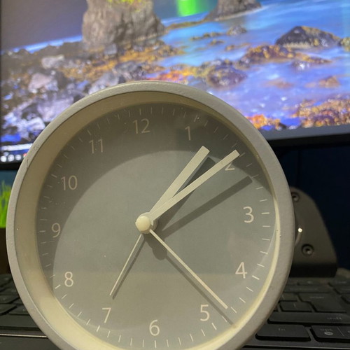 Table clock gray with alarm used, analog