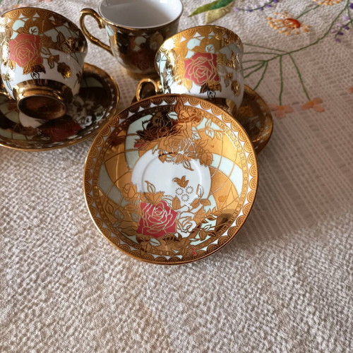 Coffee cups used, set of 4 with traditional designs