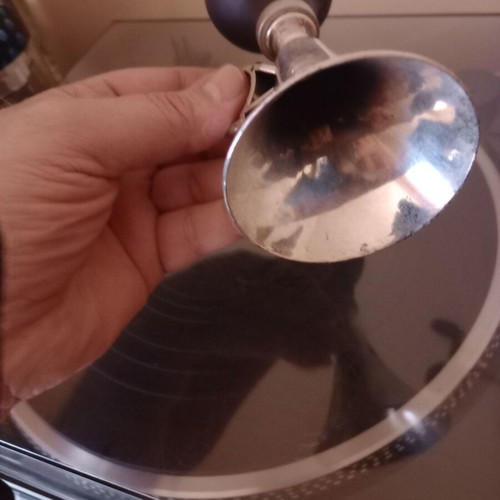 Horn like new, plastic nickel-plated with handlebar mount