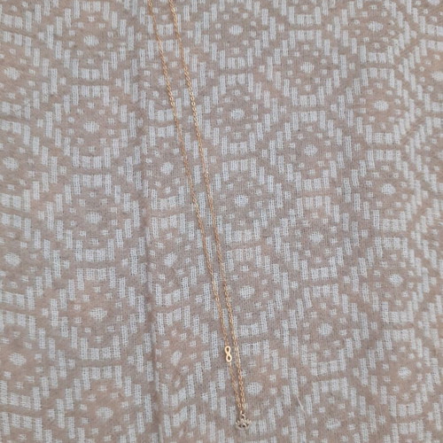 Short necklace with eye and infinity symbol new, gold color