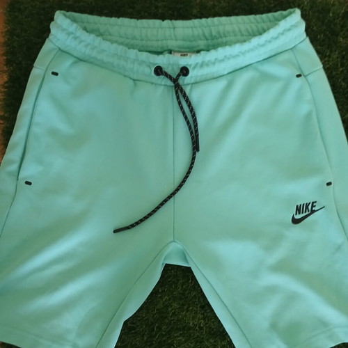 Nike shorts, turquoise and black, size M