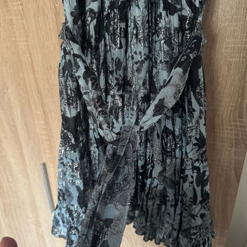 Short sleeveless dress with silver thread, like new, size M