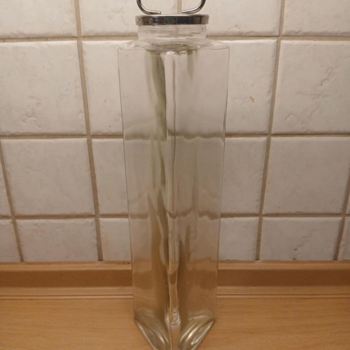 Glass triangular tall storage vase like new