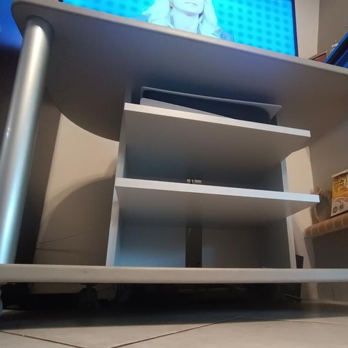 TV stand like new with wheels and 3 shelves